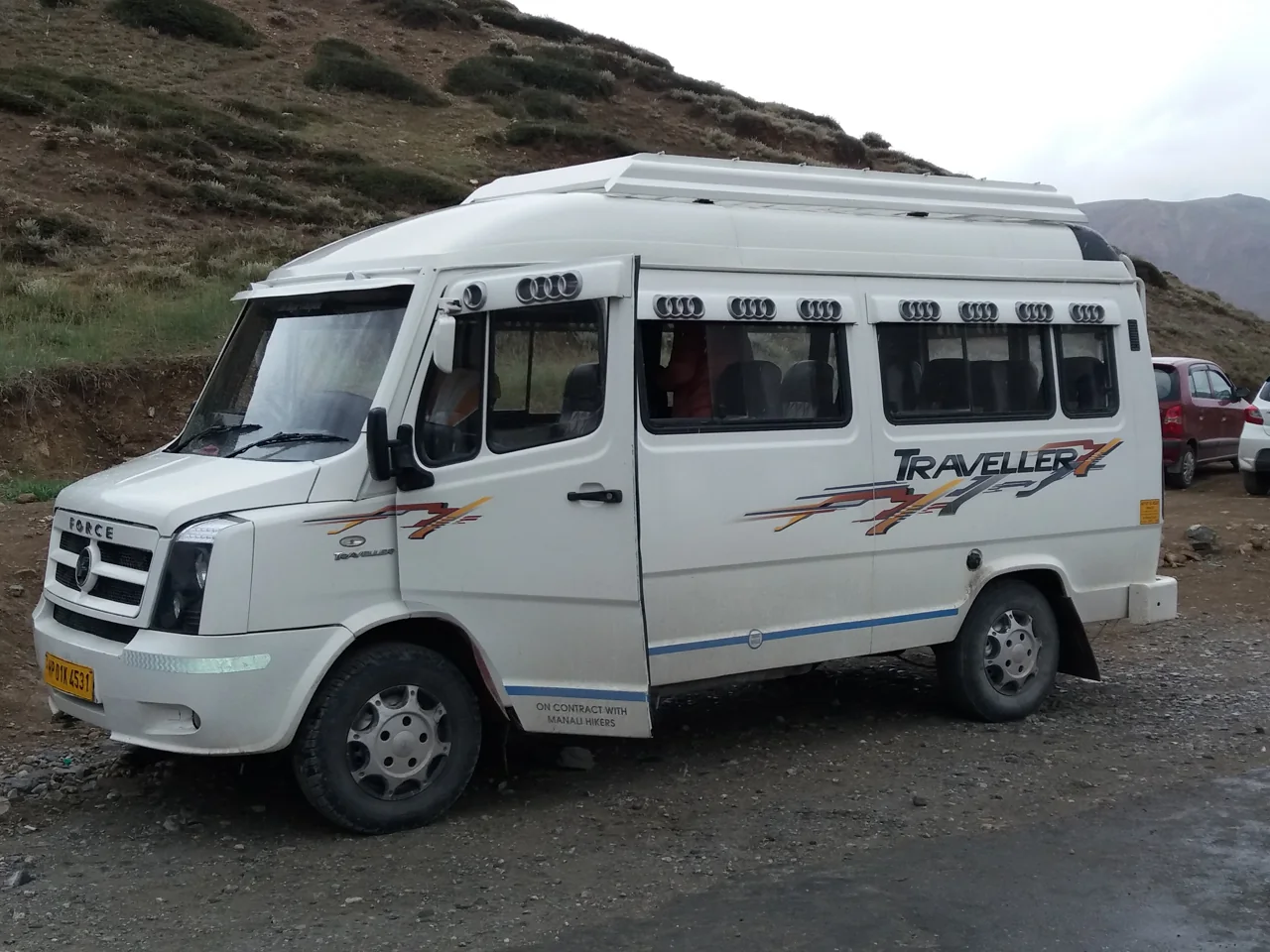 Tempo Traveller 12 Seater model reference photo